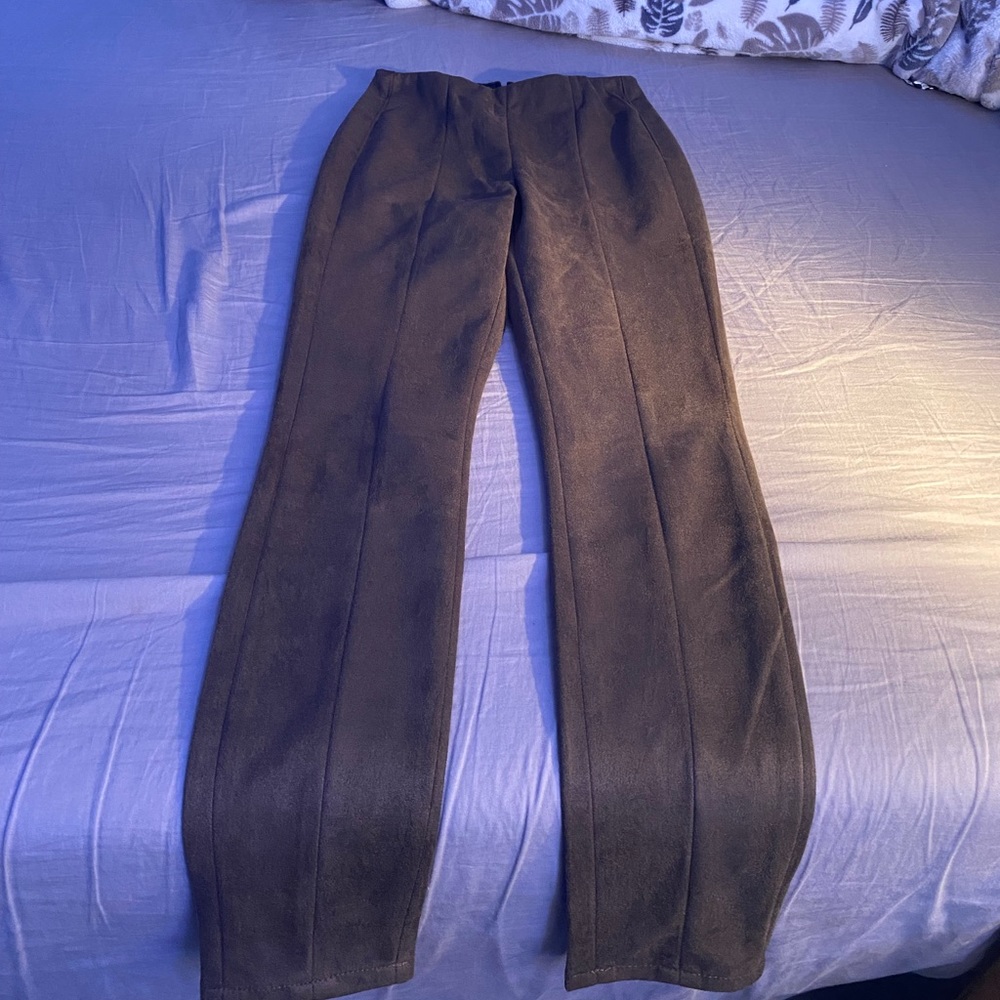 Stretch forest green pants. Zipper in back. Never worn